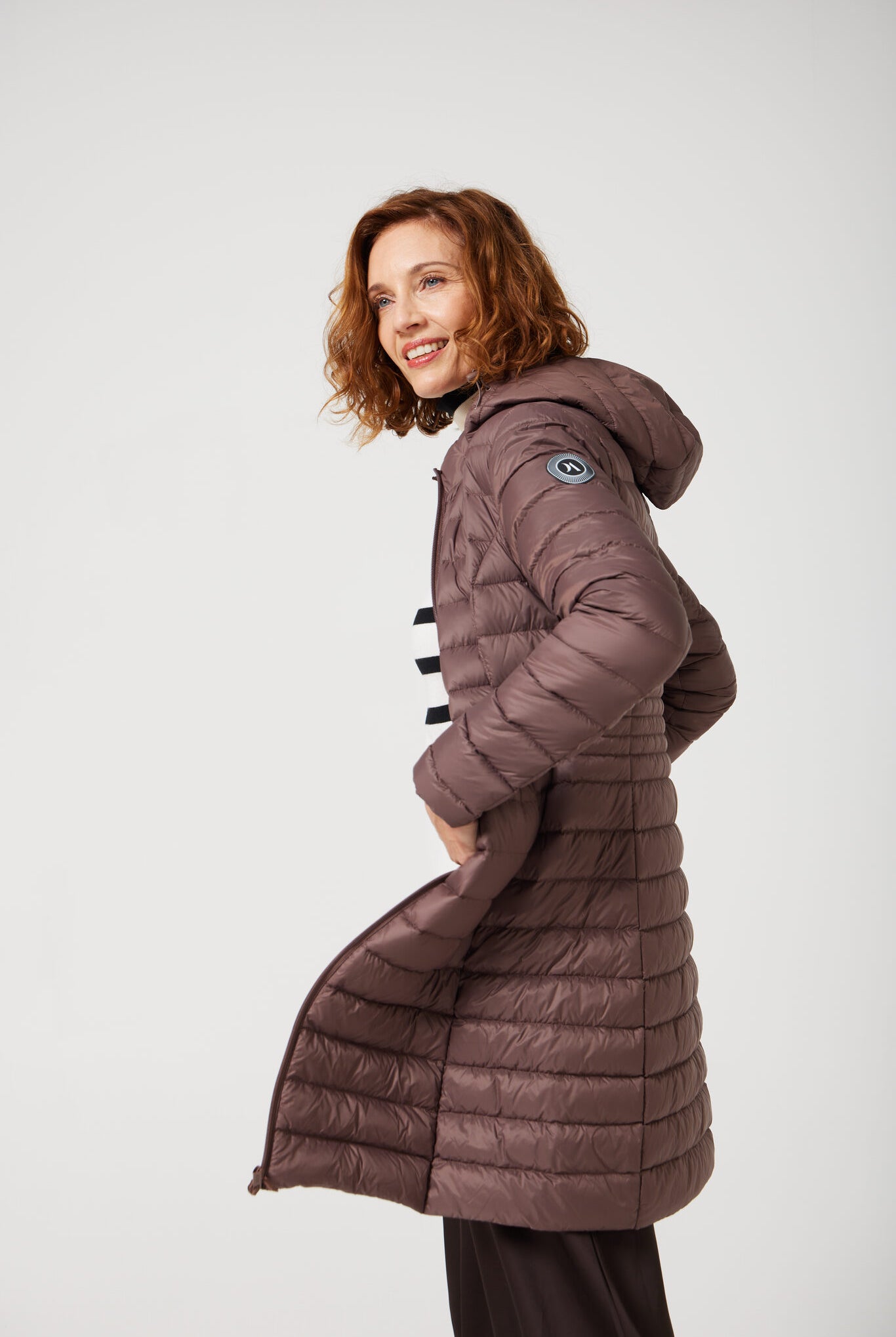 Women’s insulated midi-length hooded parka in espresso brown, designed for warmth and comfort in South Africa’s winter season — Espresso Midi Parka™