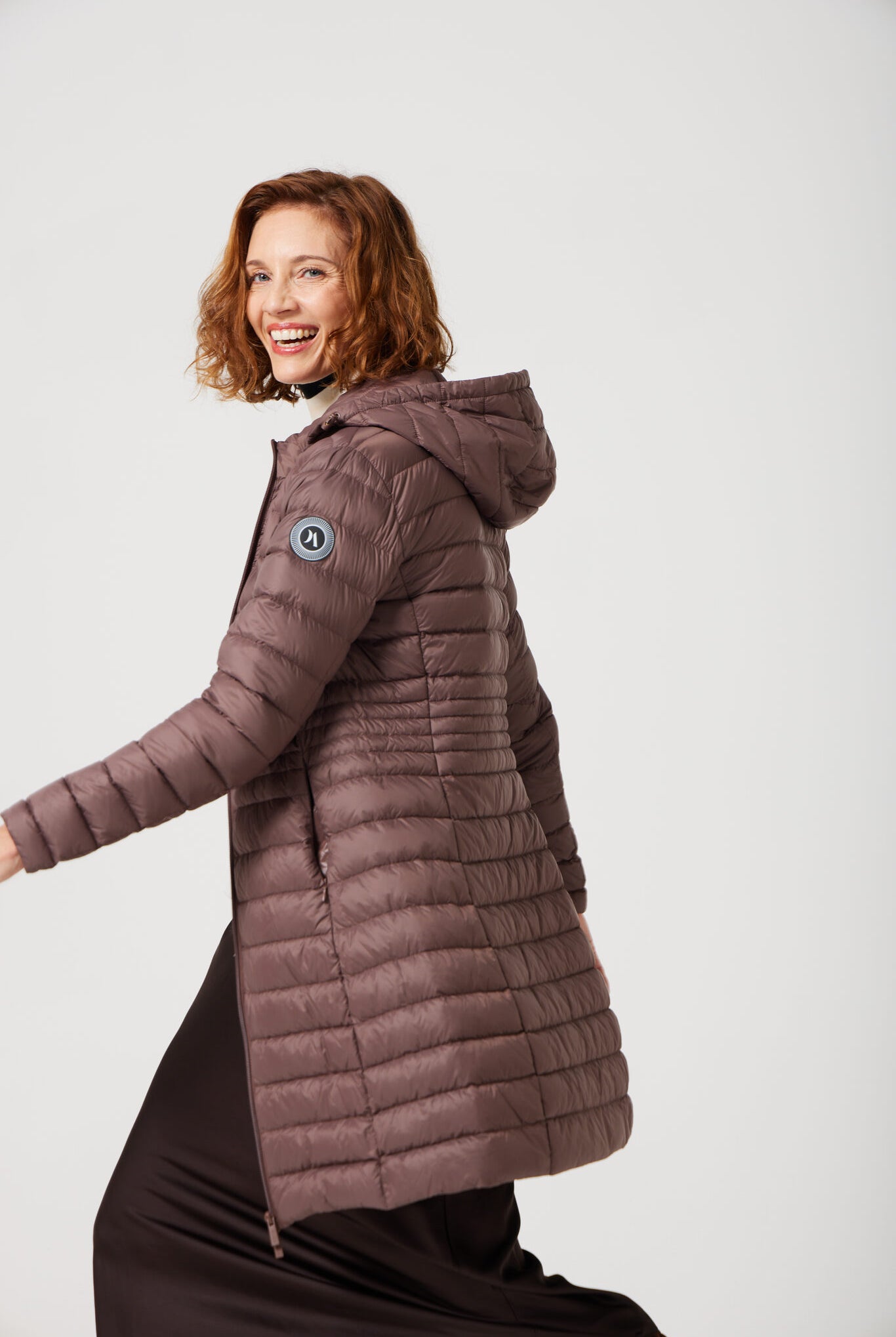Women’s insulated midi-length hooded parka in espresso brown, designed for warmth and comfort in South Africa’s winter season — Espresso Midi Parka™
