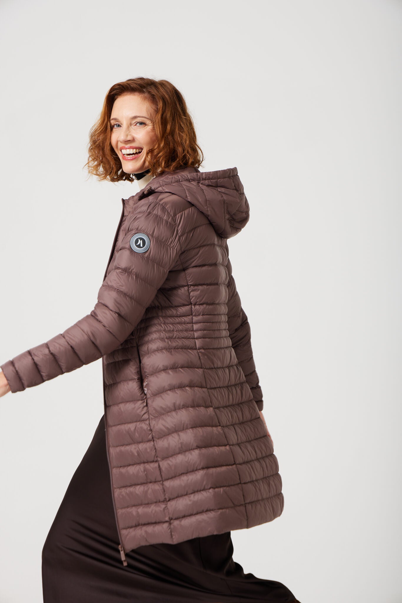 Women’s insulated midi-length hooded parka in espresso brown, designed for warmth and comfort in South Africa’s winter season — Espresso Midi Parka™