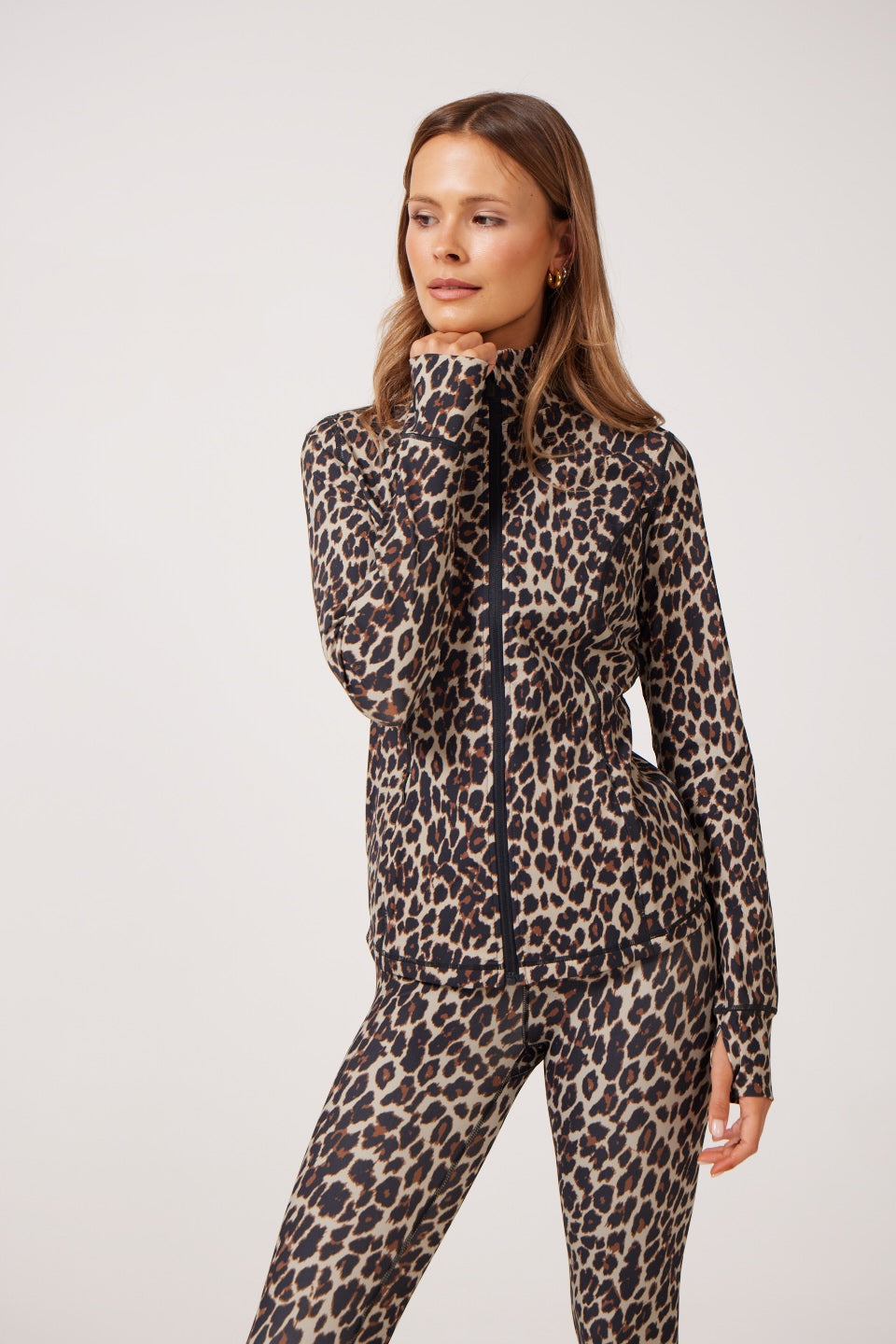 Leopard Lightweight performance jacket with a smooth, sculpting fit, full zip front, high collar, and stretch fabric designed for everyday movement and layering.