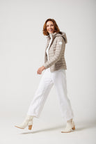 Women’s Latte Classic Jacket™ in a soft beige shade, lightweight puffer jacket with hood, perfect for layering during cool South African weather