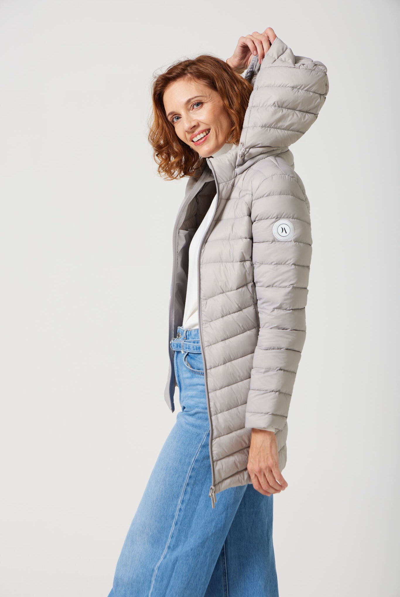 Women’s insulated hooded parka in latte, designed for warmth and comfort in South Africa’s winter season — Latte Classic Parka™