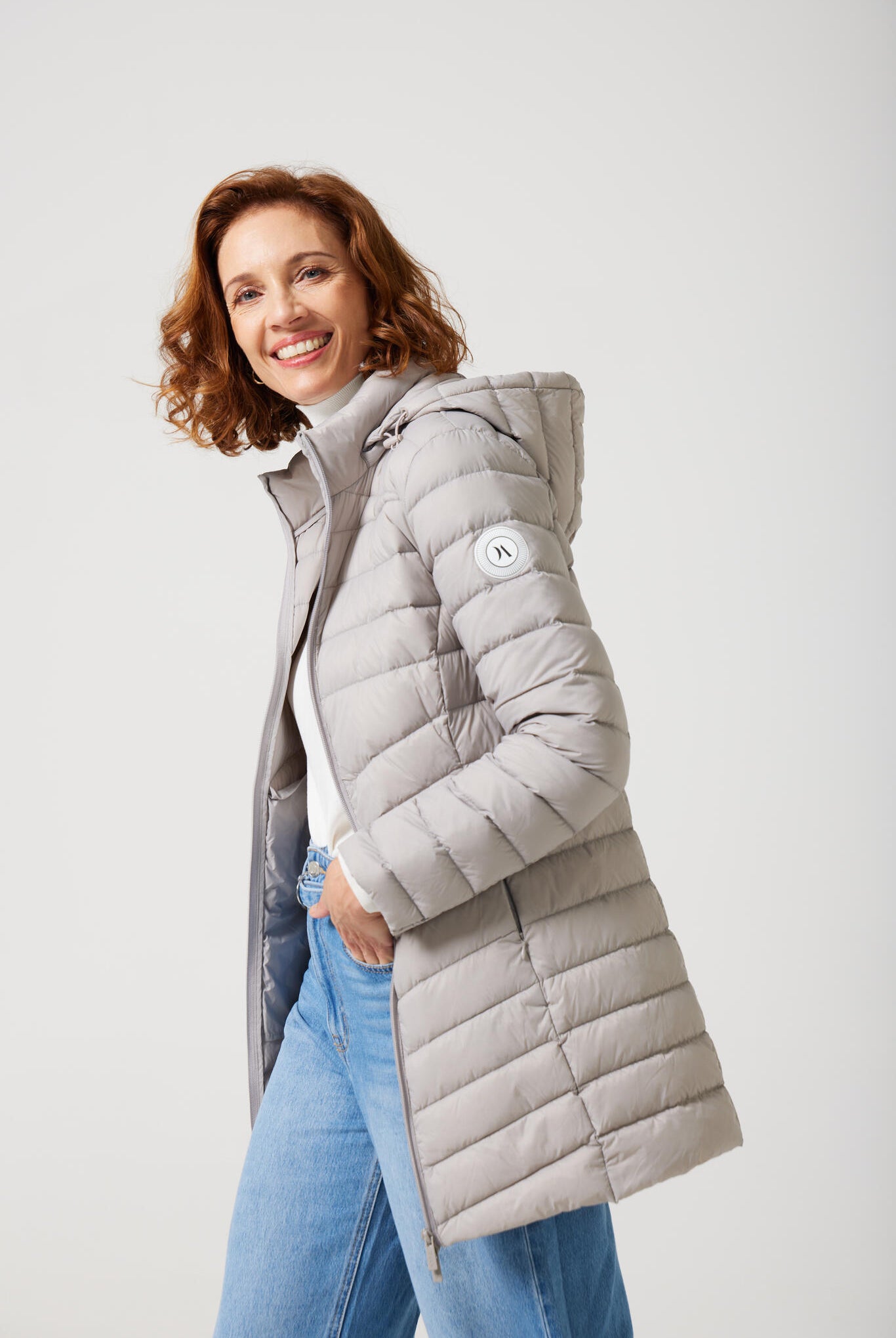 Women’s insulated hooded parka in latte, designed for warmth and comfort in South Africa’s winter season — Latte Classic Parka™
