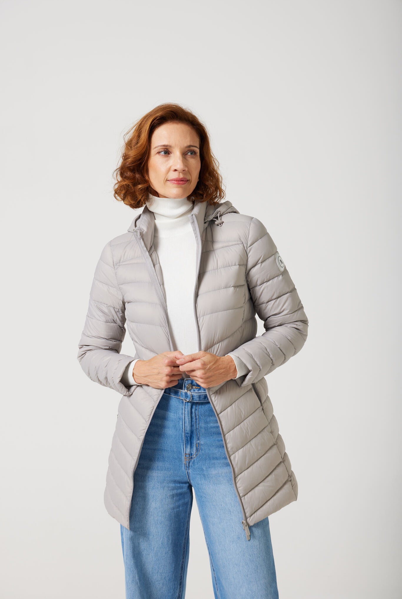 Women’s insulated hooded parka in latte, designed for warmth and comfort in South Africa’s winter season — Latte Classic Parka™