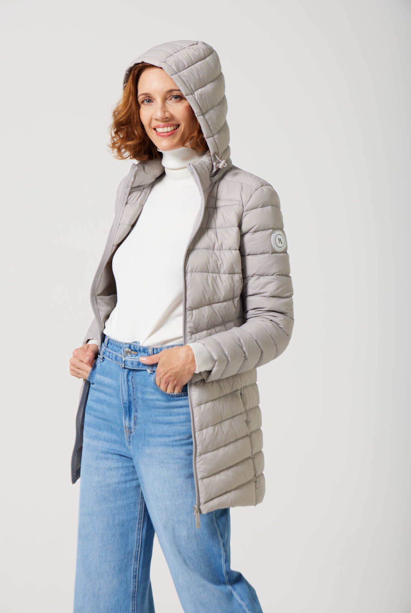 Women’s insulated hooded parka in latte, designed for warmth and comfort in South Africa’s winter season — Latte Classic Parka™
