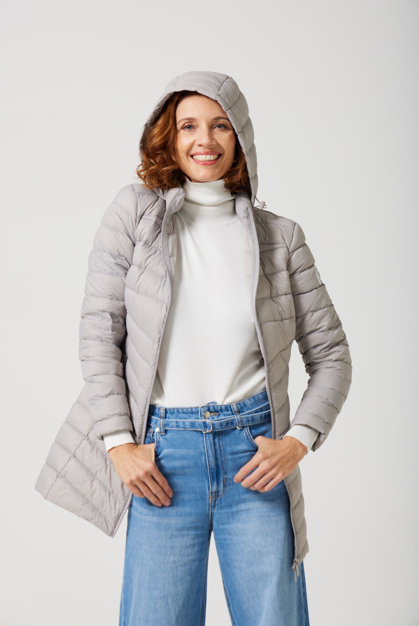 Women’s insulated hooded parka in latte, designed for warmth and comfort in South Africa’s winter season — Latte Classic Parka™