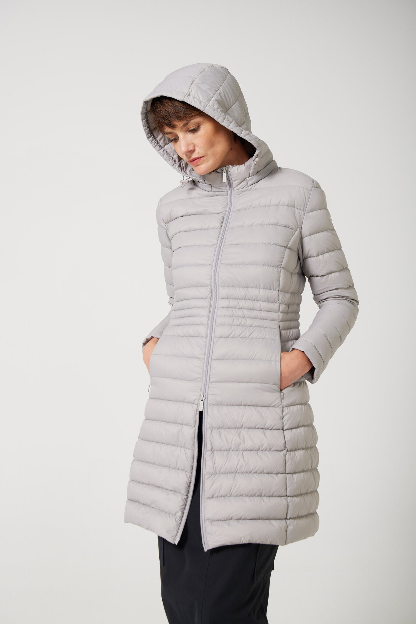 Women’s insulated midi-length hooded parka in latte, designed for warmth and comfort in South Africa’s winter season — Latte Midi Parka™