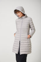 Women’s insulated midi-length hooded parka in latte, designed for warmth and comfort in South Africa’s winter season — Latte Midi Parka™