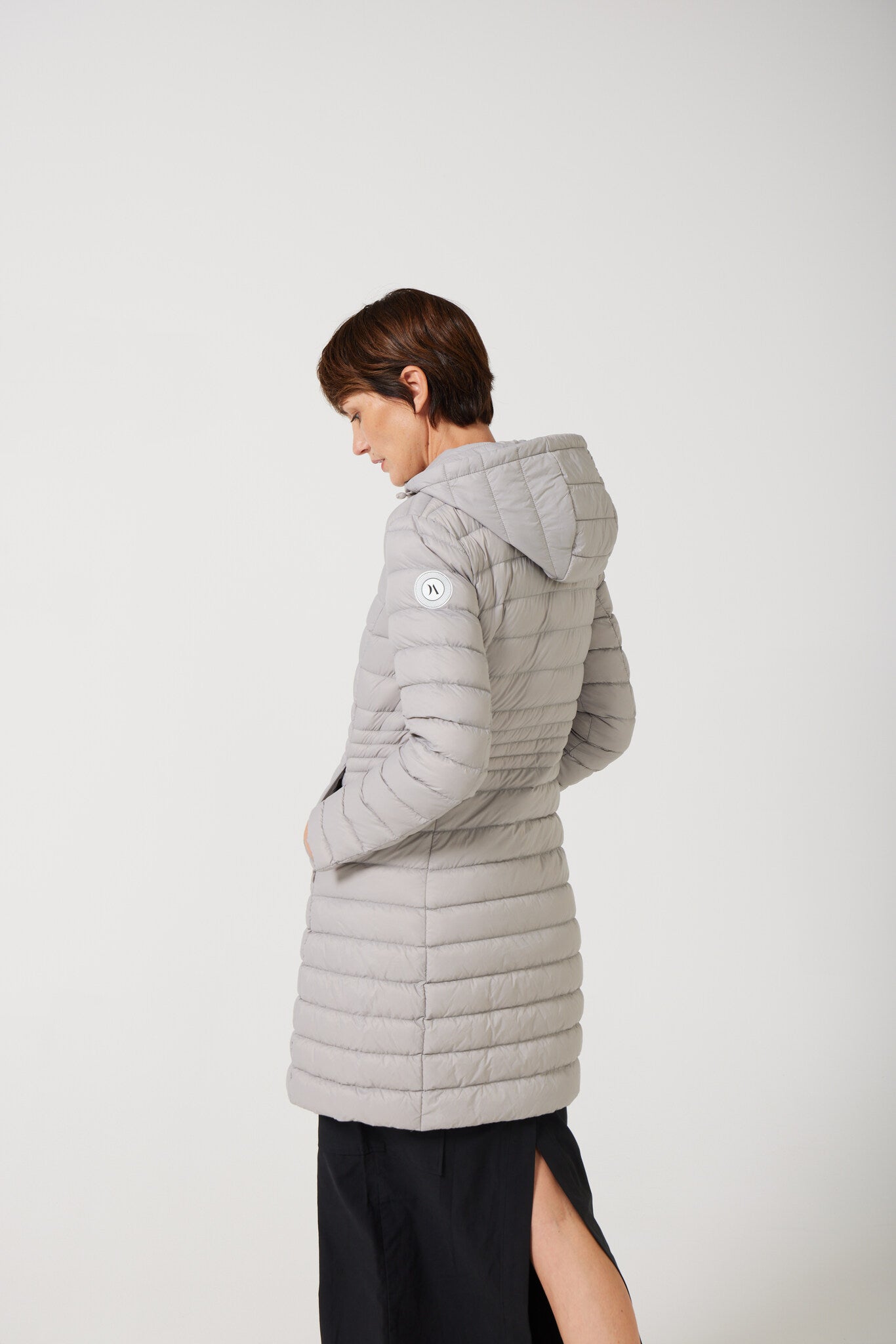 Women’s insulated midi-length hooded parka in latte, designed for warmth and comfort in South Africa’s winter season — Latte Midi Parka™