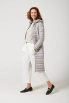 Women’s insulated ultra-length hooded parka in latte beige, designed for extra warmth and comfort in South Africa’s winter season — Latte Ultra Parka™