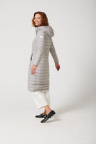 Women’s insulated ultra-length hooded parka in latte beige, designed for extra warmth and comfort in South Africa’s winter season — Latte Ultra Parka™