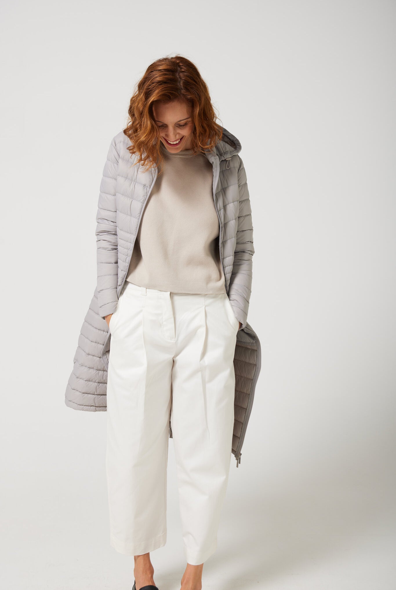 Women’s insulated ultra-length hooded parka in latte beige, designed for extra warmth and comfort in South Africa’s winter season — Latte Ultra Parka™