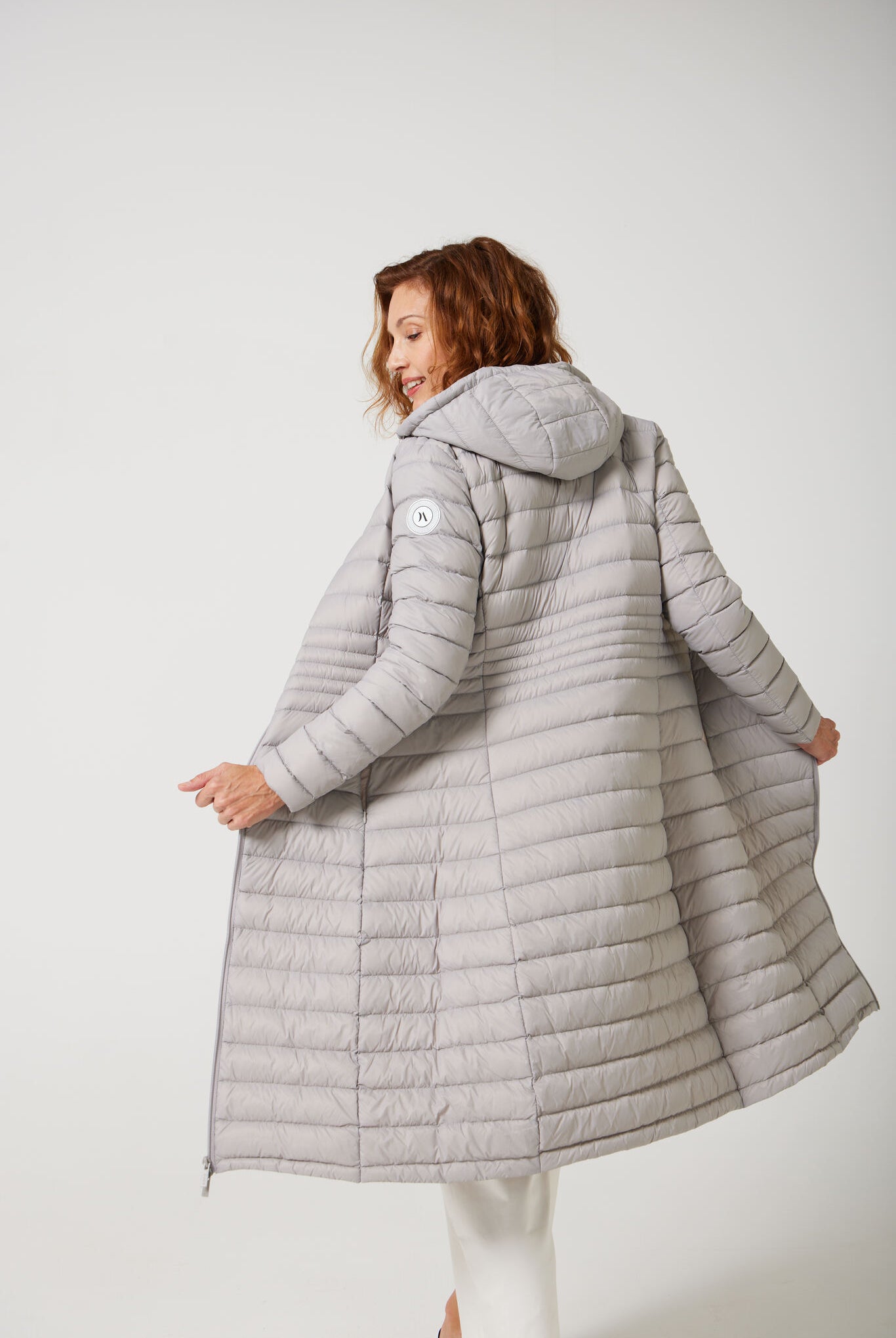 Women’s insulated ultra-length hooded parka in latte beige, designed for extra warmth and comfort in South Africa’s winter season — Latte Ultra Parka™