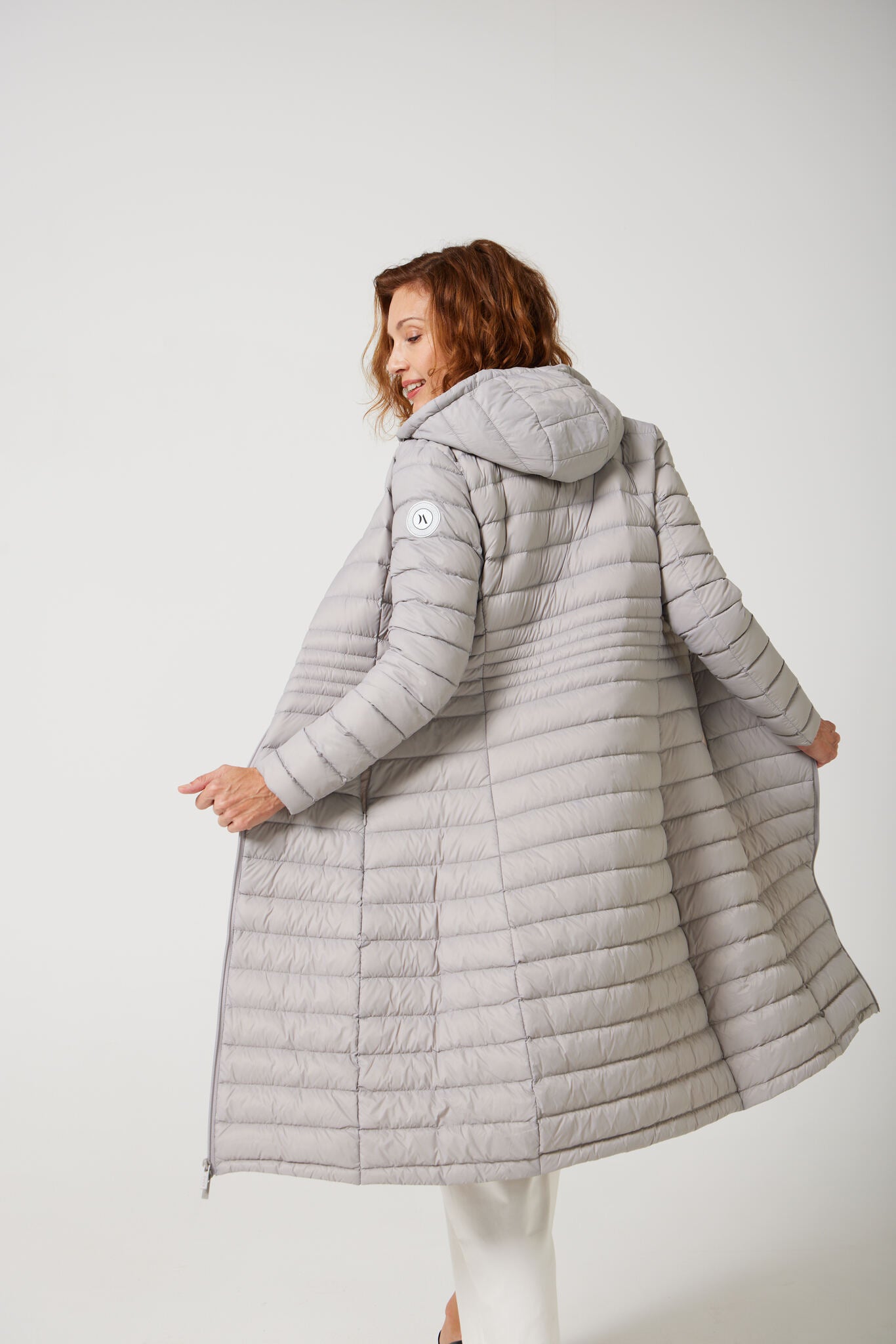 Women’s insulated ultra-length hooded parka in latte beige, designed for extra warmth and comfort in South Africa’s winter season — Latte Ultra Parka™