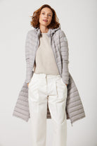 Women’s insulated ultra-length hooded parka in latte beige, designed for extra warmth and comfort in South Africa’s winter season — Latte Ultra Parka™