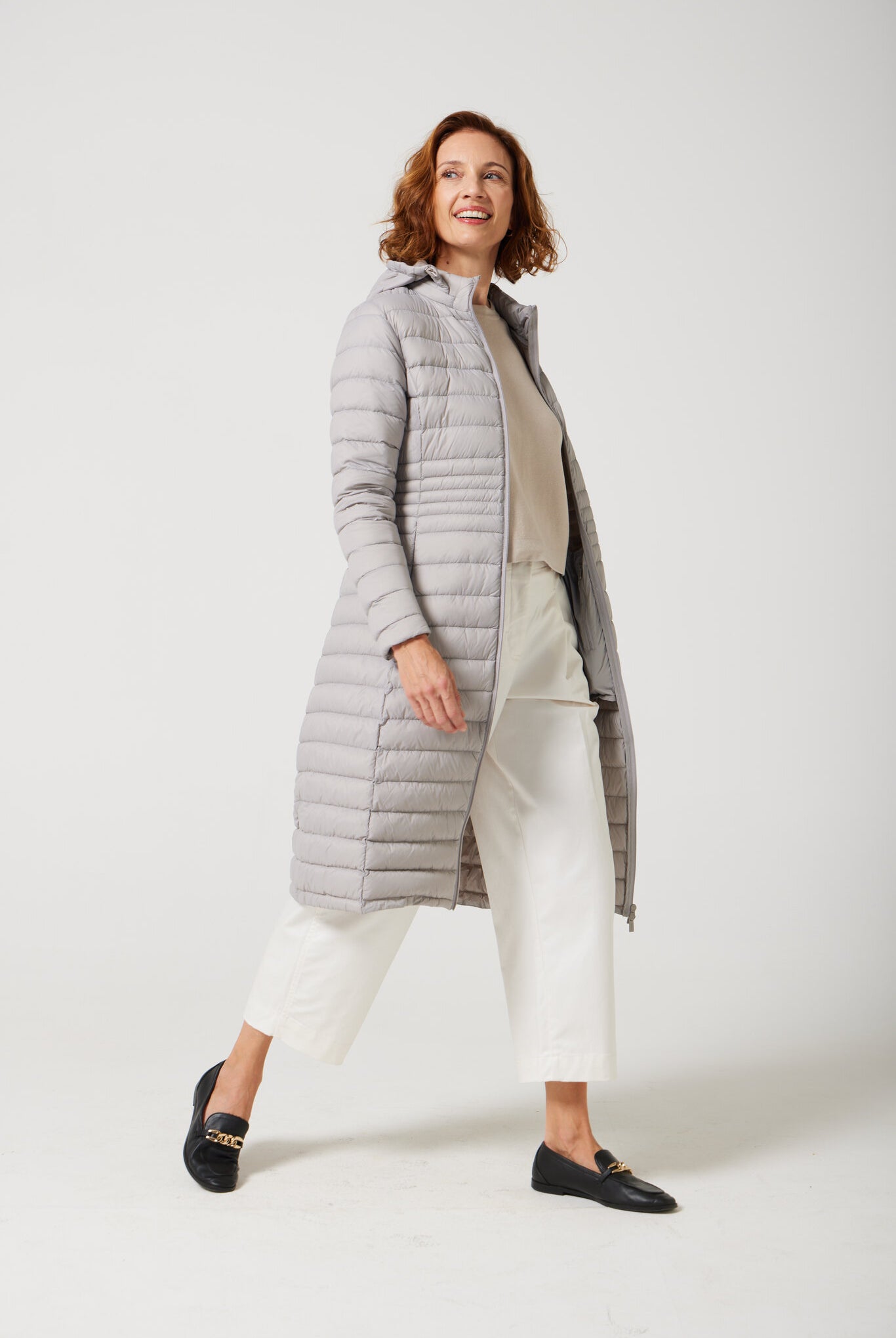 Women’s insulated ultra-length hooded parka in latte beige, designed for extra warmth and comfort in South Africa’s winter season — Latte Ultra Parka™