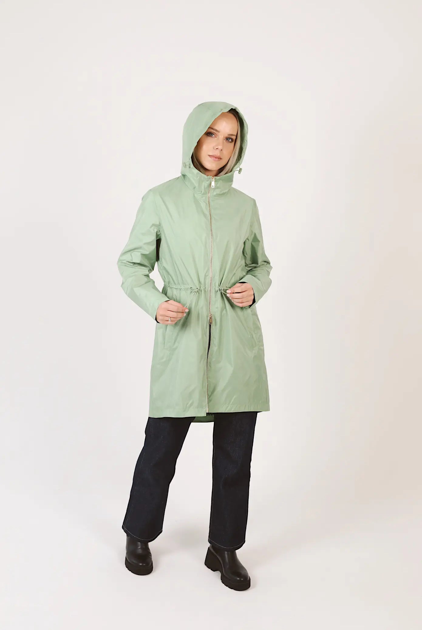 Madame Verde Vol 1 raincoat in light green with hood, stylish waterproof jacket for rainy days in South Africa