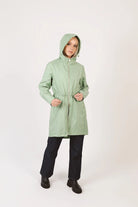 Madame Verde Vol 1 raincoat in light green with hood, stylish waterproof jacket for rainy days in South Africa
