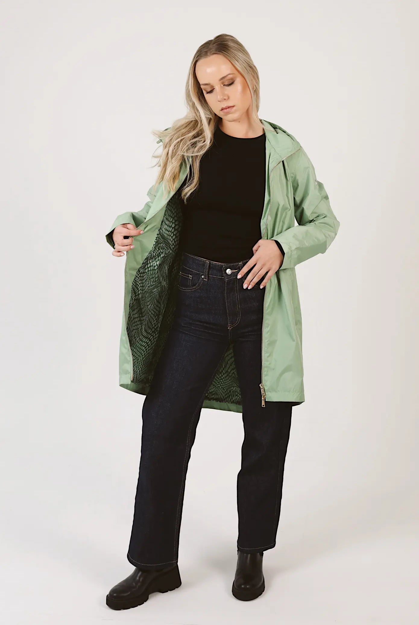 Madame Verde Vol 1 raincoat in light green with hood, stylish waterproof jacket for rainy days in South Africa