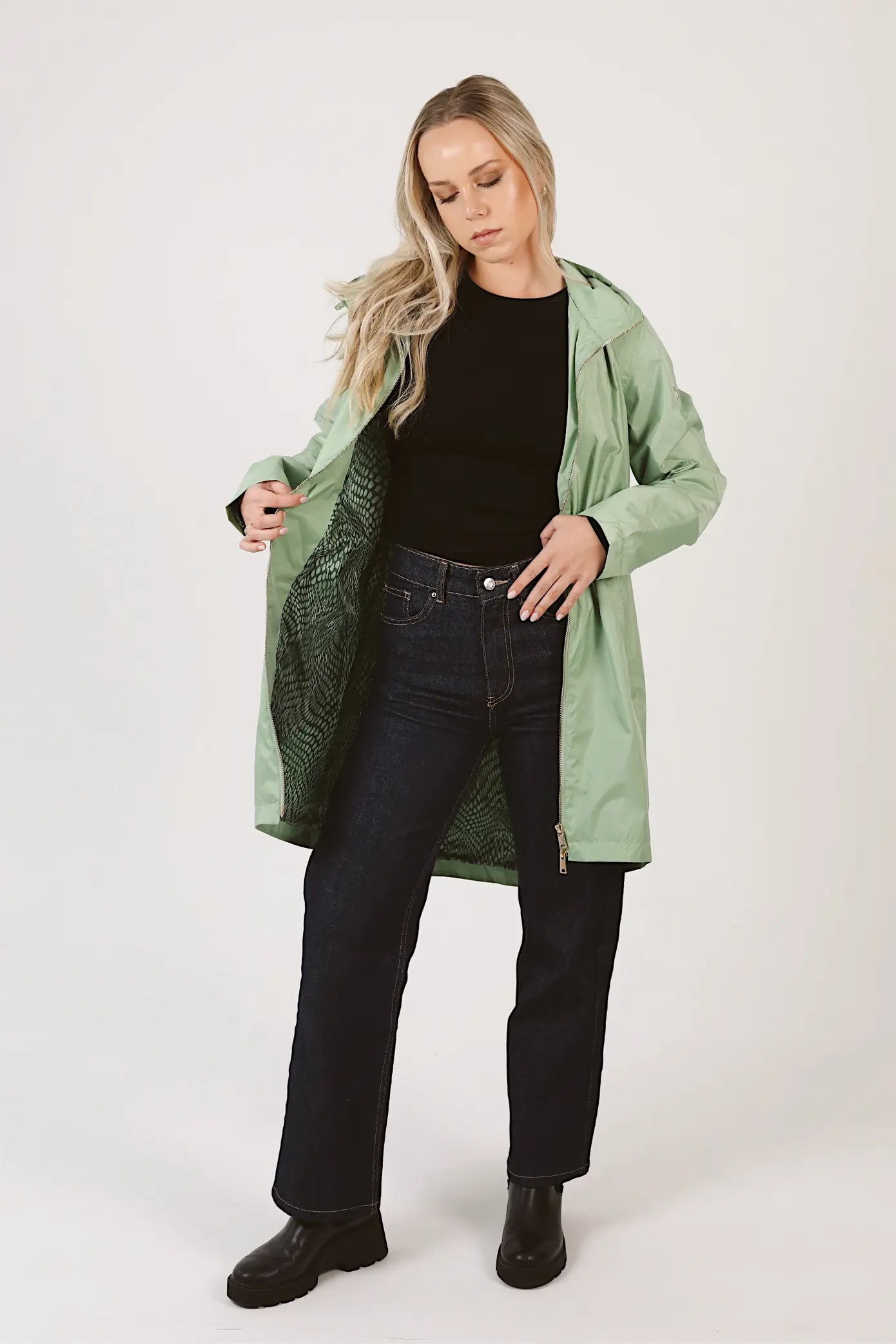 Madame Verde Vol 1 raincoat in light green with hood, stylish waterproof jacket for rainy days in South Africa