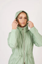 Madame Verde Vol 1 raincoat in light green with hood, stylish waterproof jacket for rainy days in South Africa