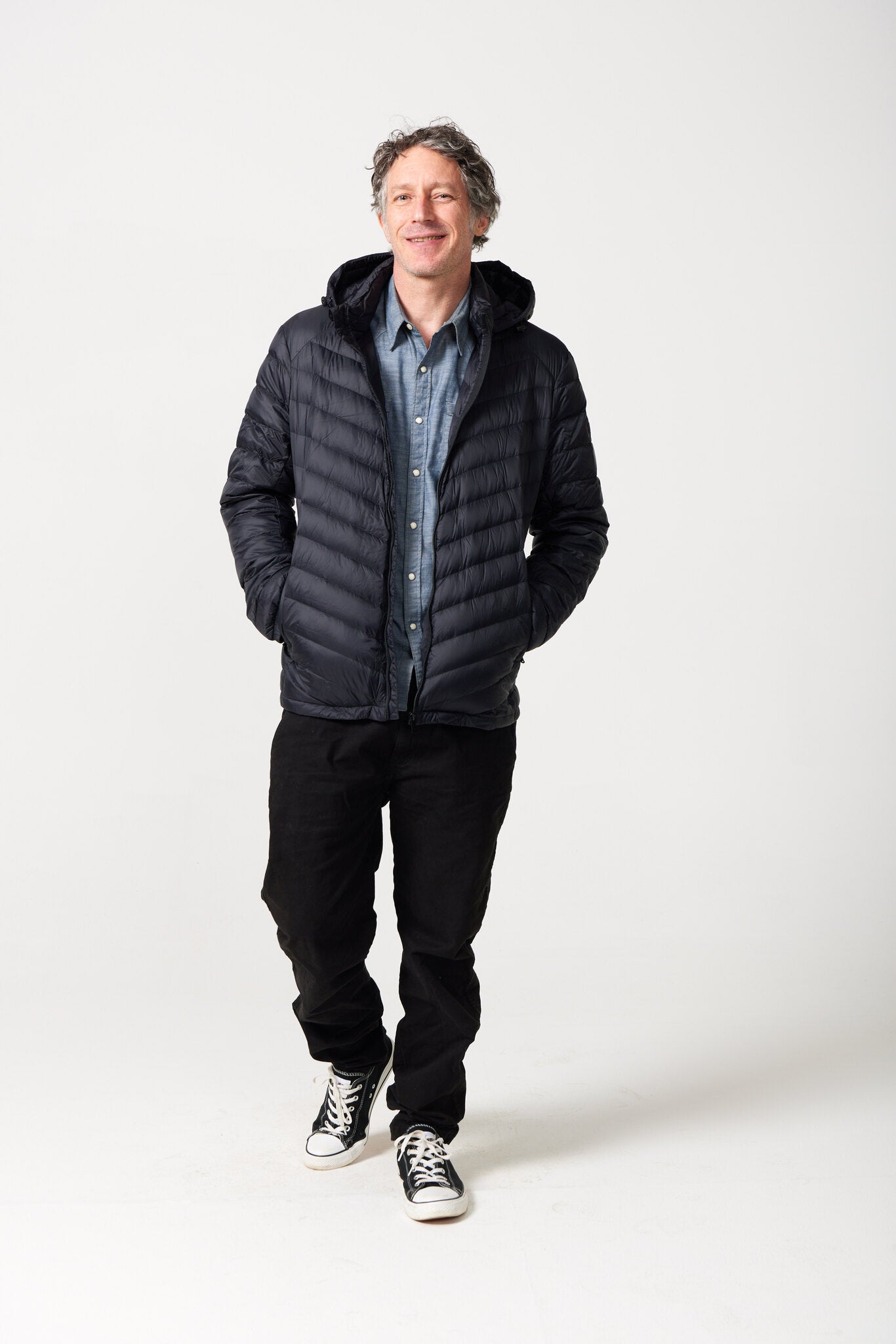 Men’s Black Classic Jacket™ in sleek black, lightweight hooded puffer jacket for layering in cool South African weather