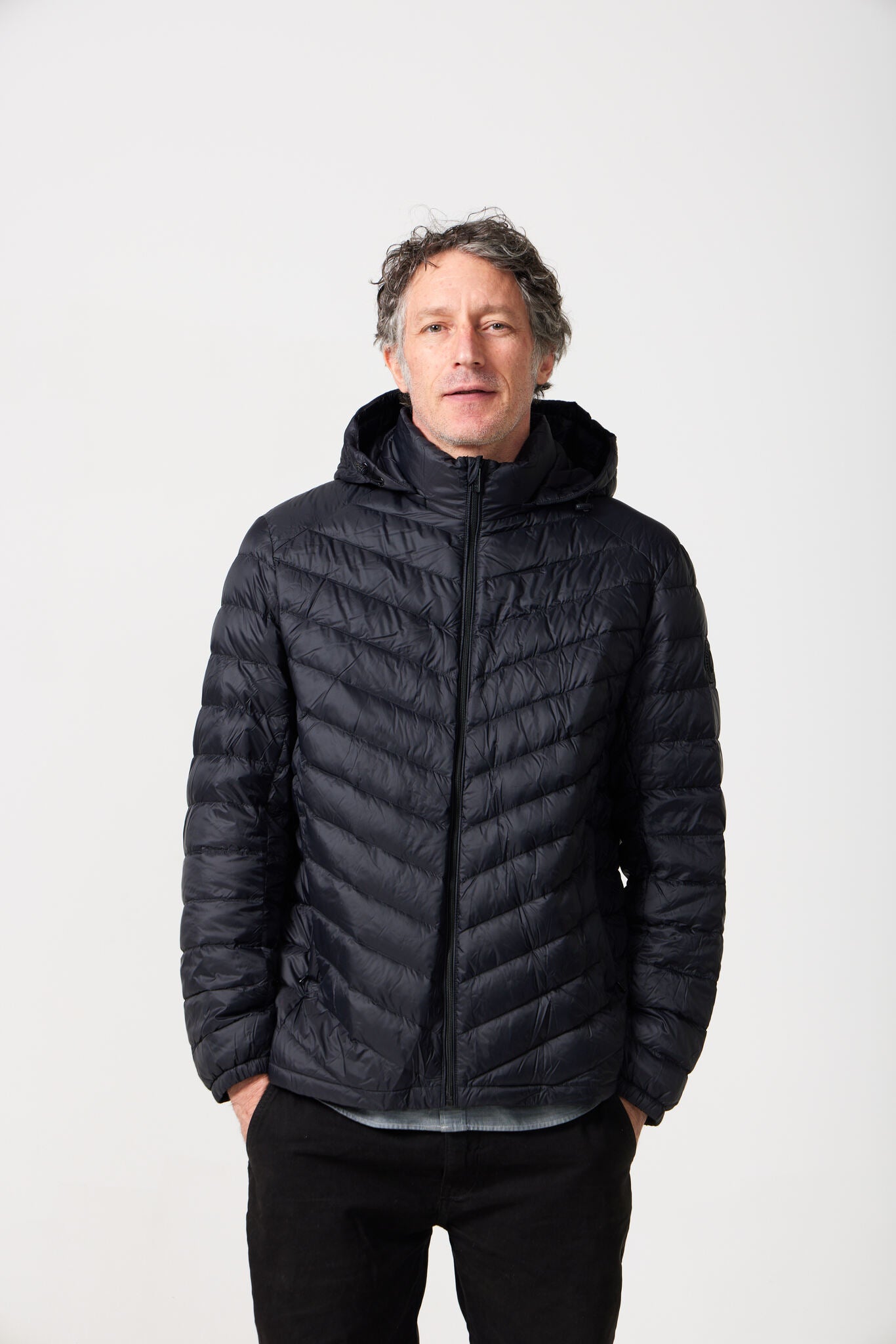 Men’s Black Classic Jacket™ in sleek black, lightweight hooded puffer jacket for layering in cool South African weather