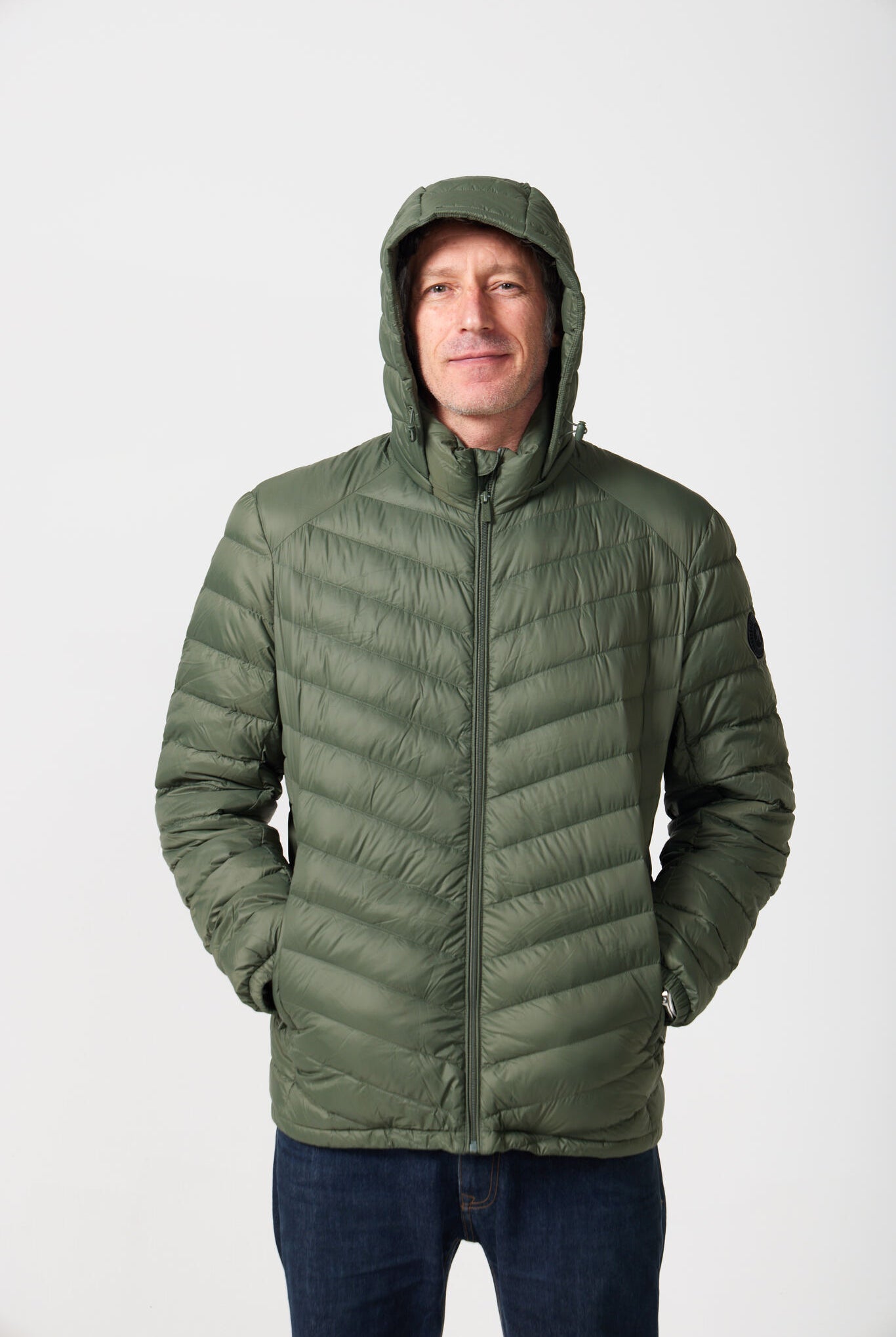 Men’s Sage Classic Jacket™ in muted green, lightweight hooded puffer jacket for casual layering during cool South African weather