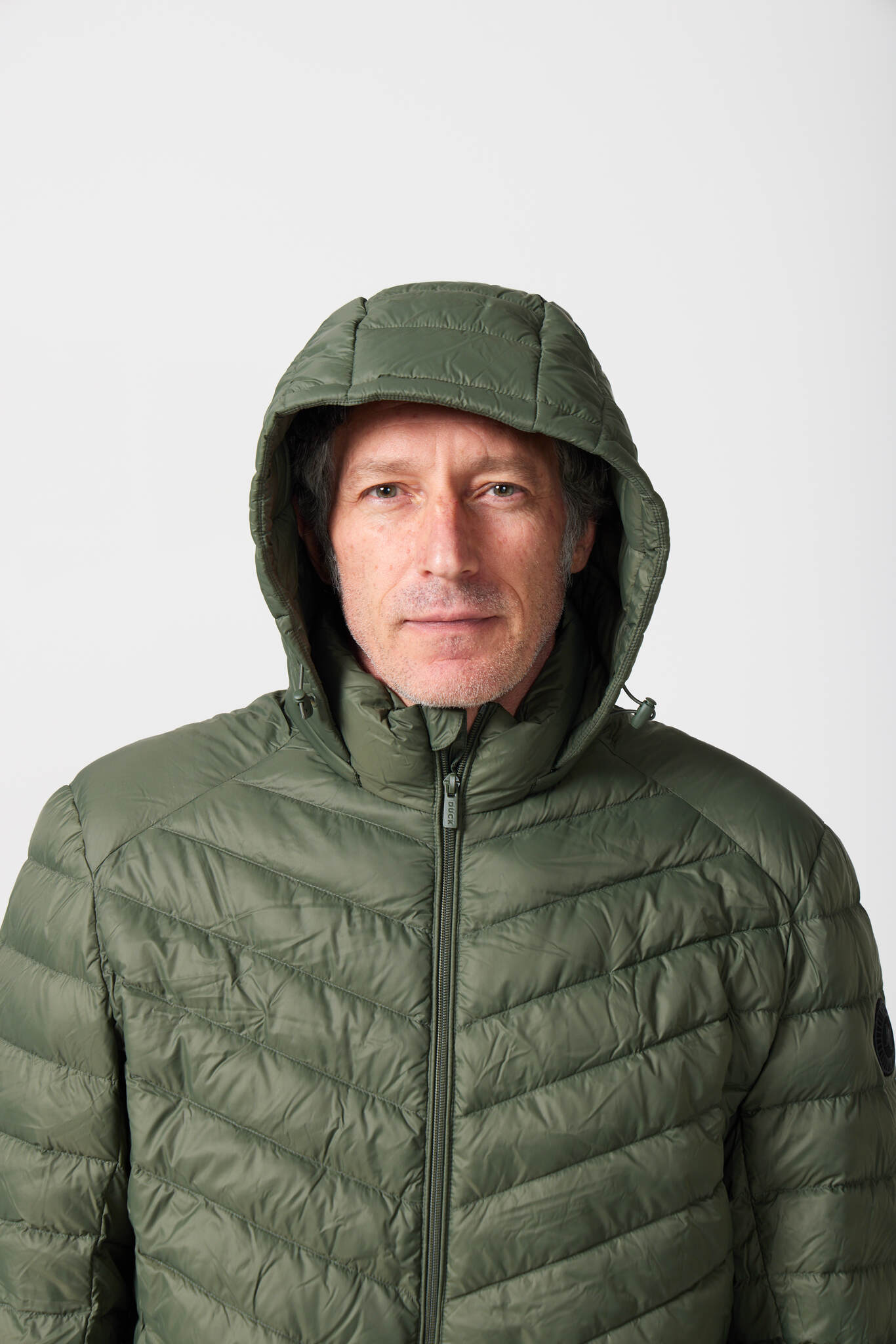 Men’s Sage Classic Jacket™ in muted green, lightweight hooded puffer jacket for casual layering during cool South African weather