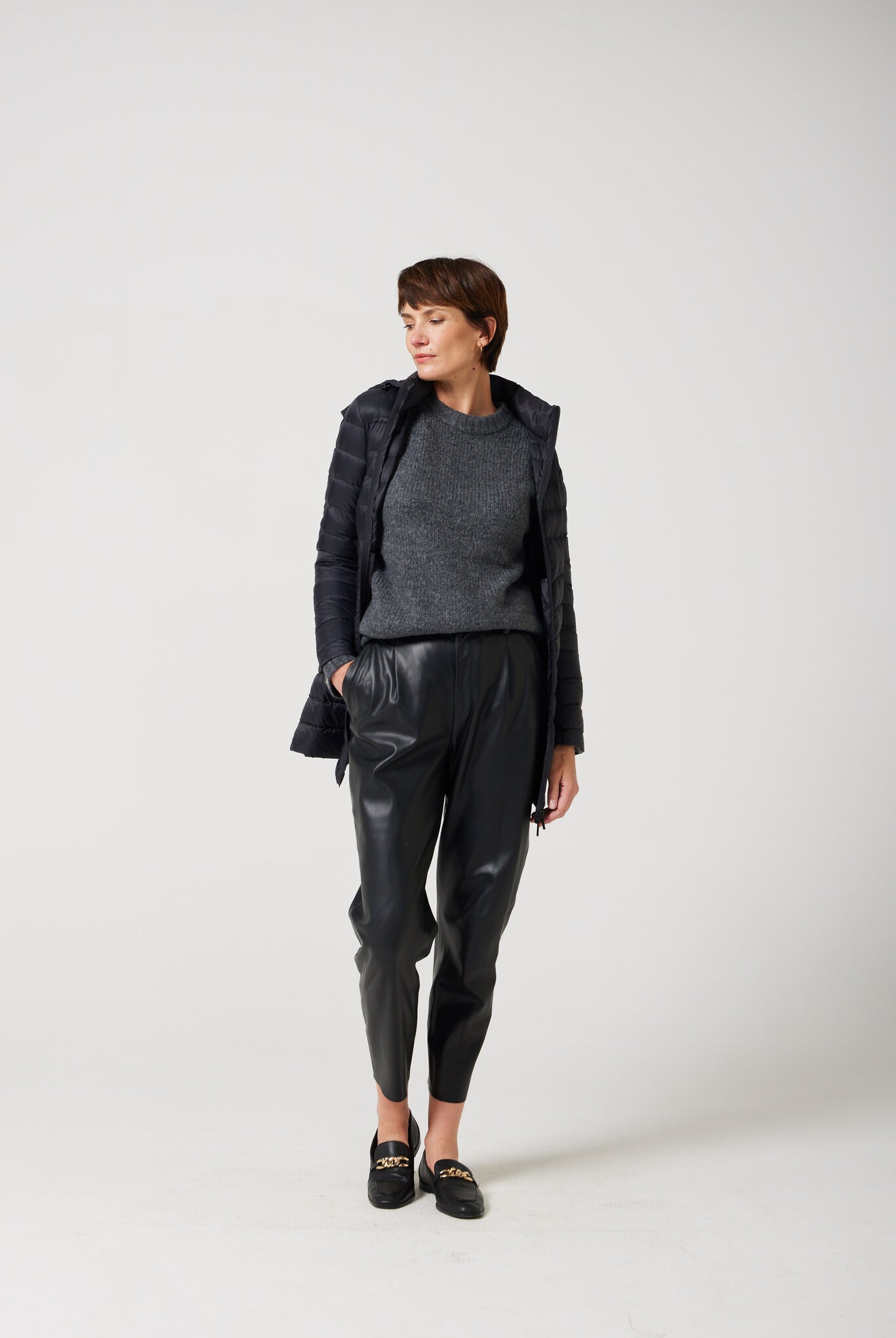 Women’s insulated hooded parka in midnight black, designed for warmth and comfort in South Africa’s winter season — Midnight Classic Parka™