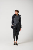 Women’s insulated hooded parka in midnight black, designed for warmth and comfort in South Africa’s winter season — Midnight Classic Parka™