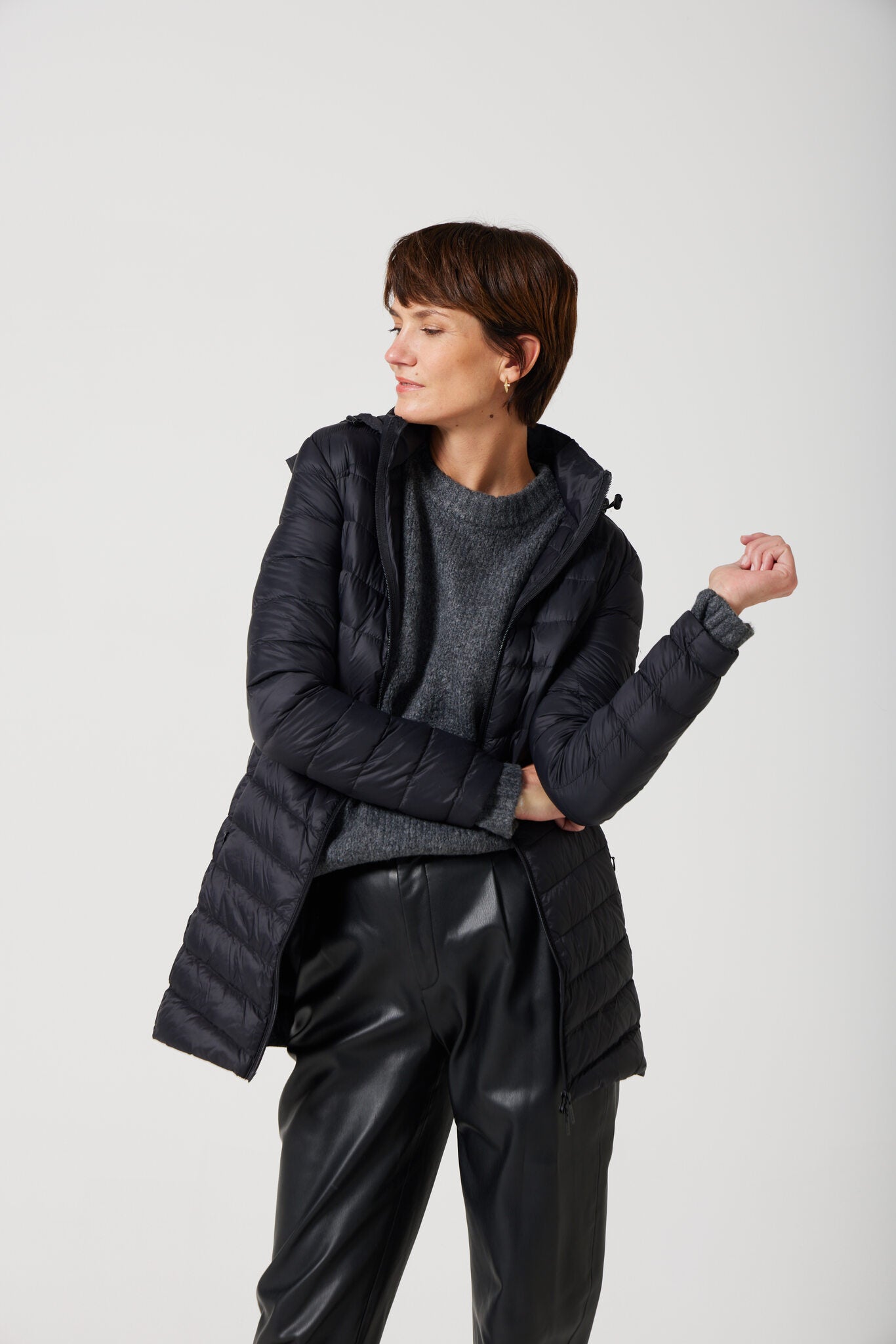 Women’s insulated hooded parka in midnight black, designed for warmth and comfort in South Africa’s winter season — Midnight Classic Parka™