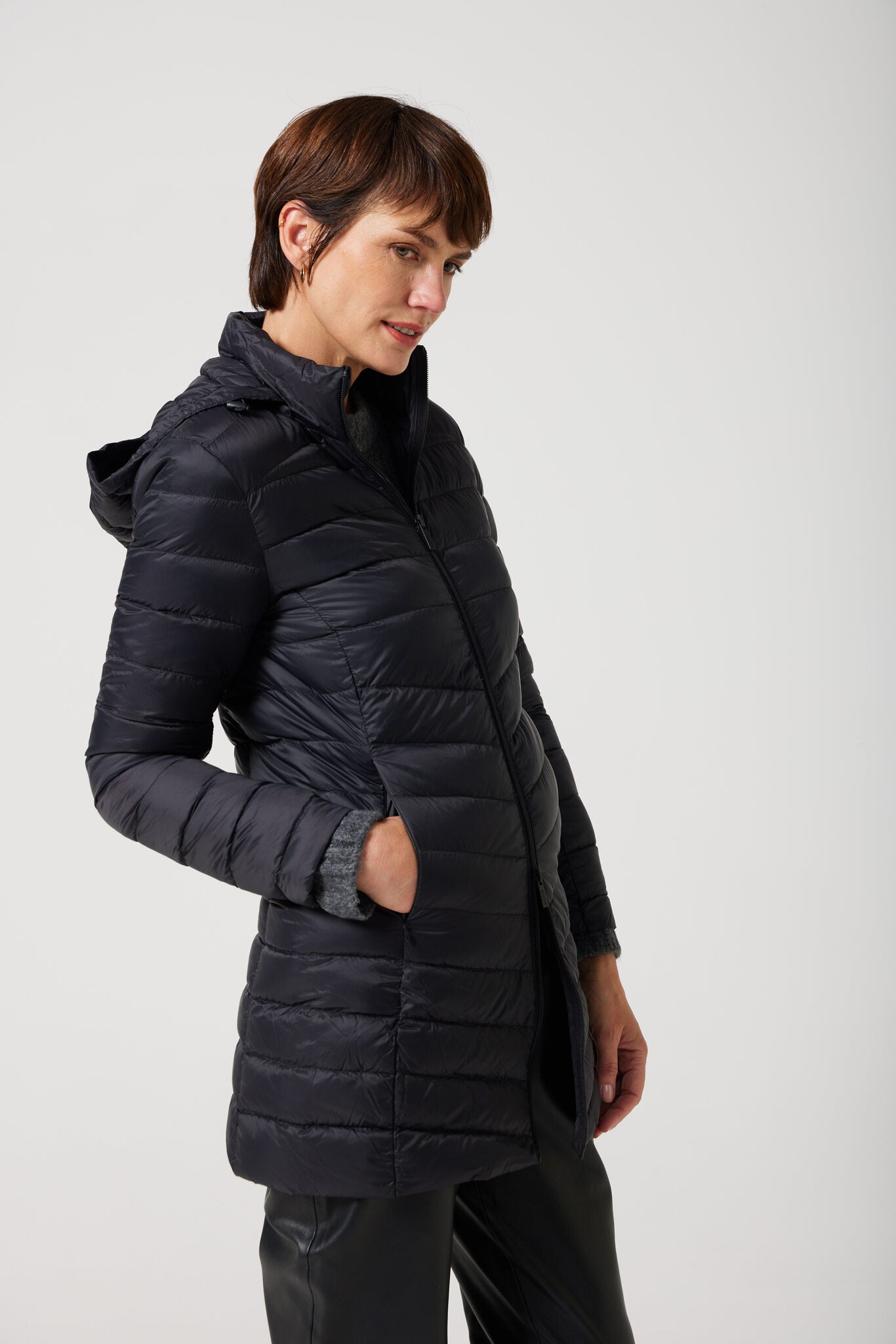 Women’s insulated hooded parka in midnight black, designed for warmth and comfort in South Africa’s winter season — Midnight Classic Parka™