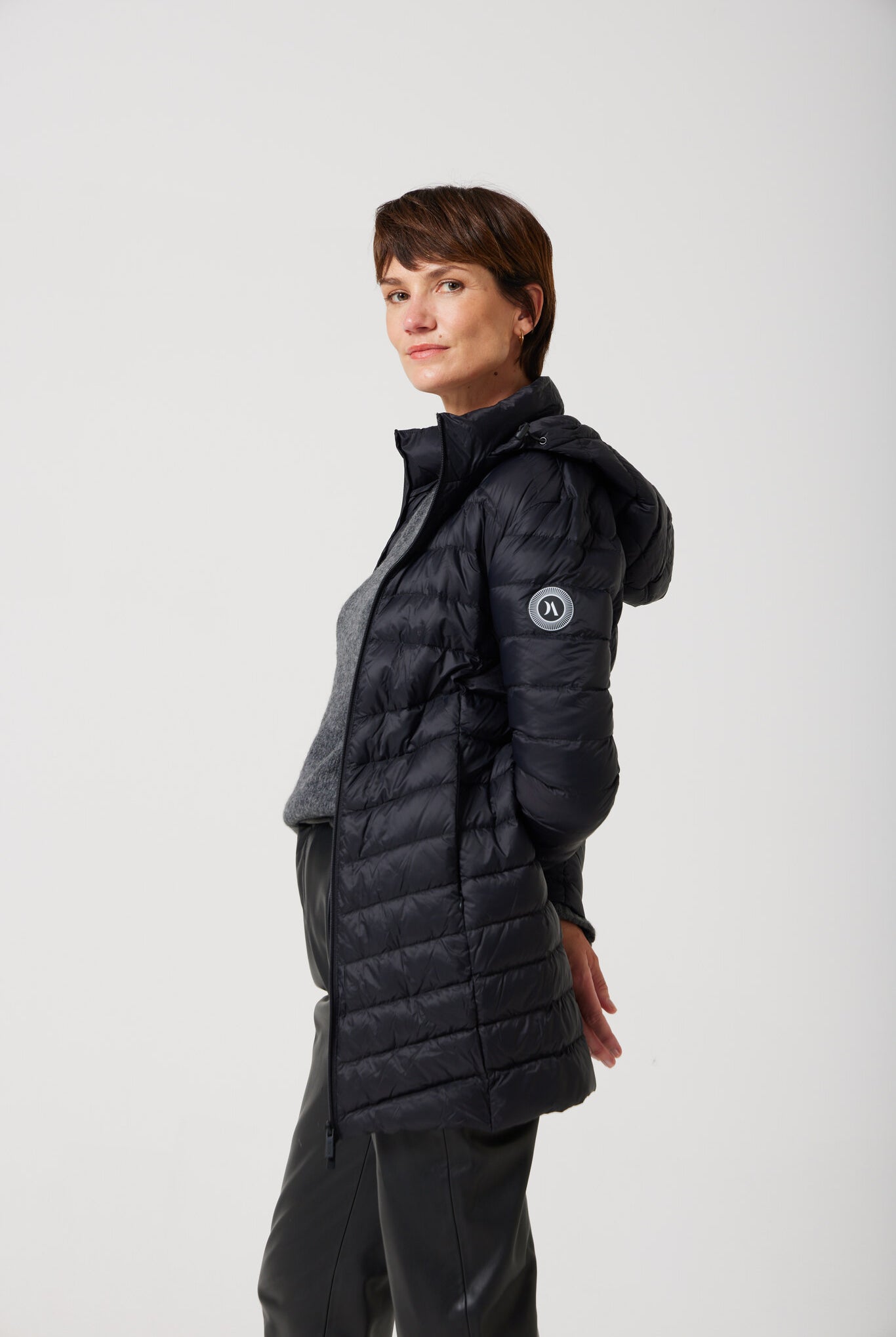 Women’s insulated hooded parka in midnight black, designed for warmth and comfort in South Africa’s winter season — Midnight Classic Parka™