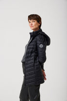 Women’s insulated hooded parka in midnight black, designed for warmth and comfort in South Africa’s winter season — Midnight Classic Parka™