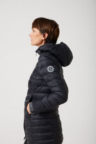 Women’s insulated hooded parka in midnight black, designed for warmth and comfort in South Africa’s winter season — Midnight Classic Parka™