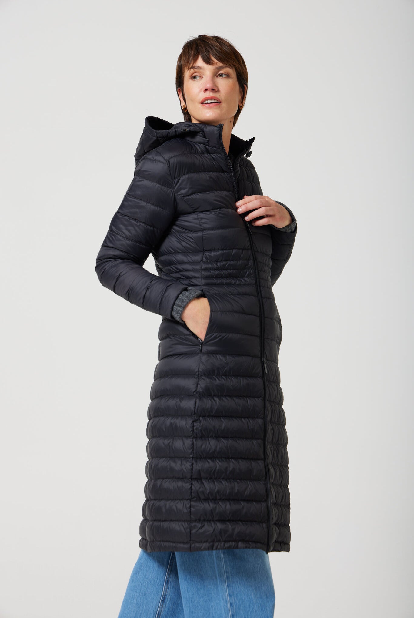 Women’s insulated ultra-length hooded parka in midnight black, designed for extra warmth and comfort in South Africa’s winter season — Midnight Ultra Parka™