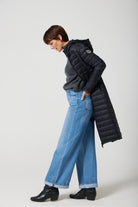 Women’s insulated ultra-length hooded parka in midnight black, designed for extra warmth and comfort in South Africa’s winter season — Midnight Ultra Parka™