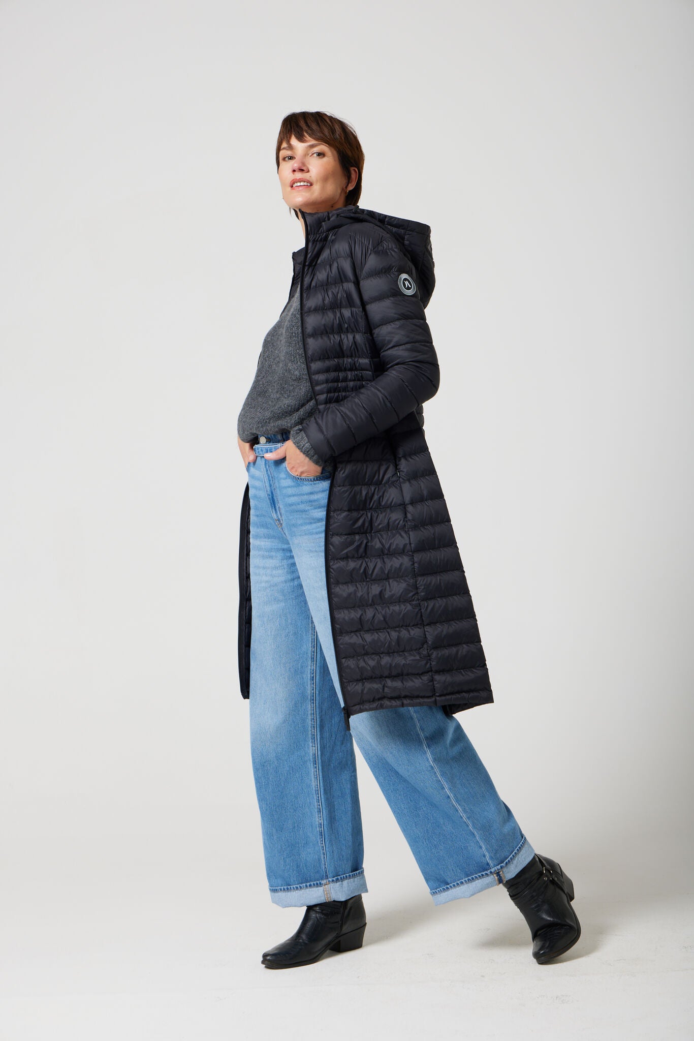 Women’s insulated ultra-length hooded parka in midnight black, designed for extra warmth and comfort in South Africa’s winter season — Midnight Ultra Parka™