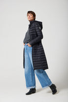 Women’s insulated ultra-length hooded parka in midnight black, designed for extra warmth and comfort in South Africa’s winter season — Midnight Ultra Parka™