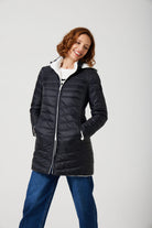 Midnight x Salt Classic Parka™ in black and white, insulated hooded parka designed for warmth and comfort in South Africa’s winter season