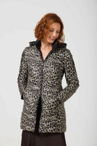 Women’s insulated reversible hooded parka in leopard print and midnight black, designed for warmth and comfort in South Africa’s winter season — Midnight x Leopard Classic Parka™
