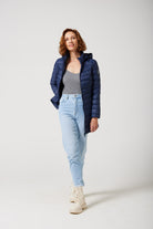 Women’s insulated hooded parka in navy blue, designed for warmth and comfort in South Africa’s winter season — Navy Classic Parka™