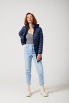 Women’s insulated hooded parka in navy blue, designed for warmth and comfort in South Africa’s winter season — Navy Classic Parka™