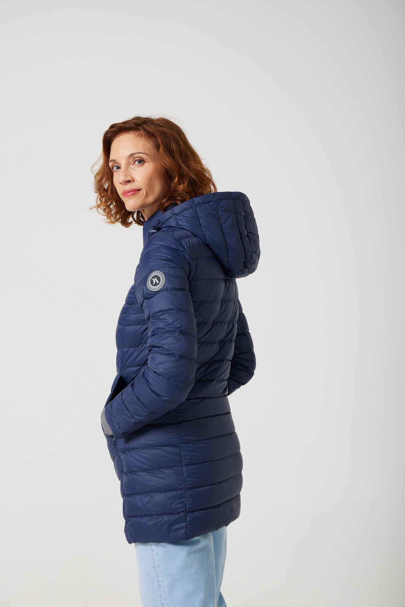 Women’s insulated hooded parka in navy blue, designed for warmth and comfort in South Africa’s winter season — Navy Classic Parka™