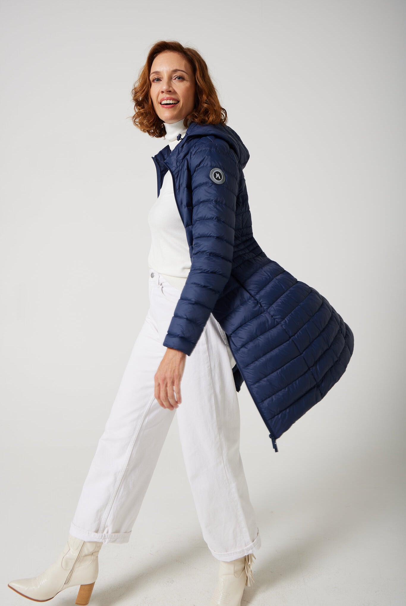 Women’s insulated midi-length hooded parka in navy blue, designed for warmth and comfort in South Africa’s winter season — Navy Midi Parka™