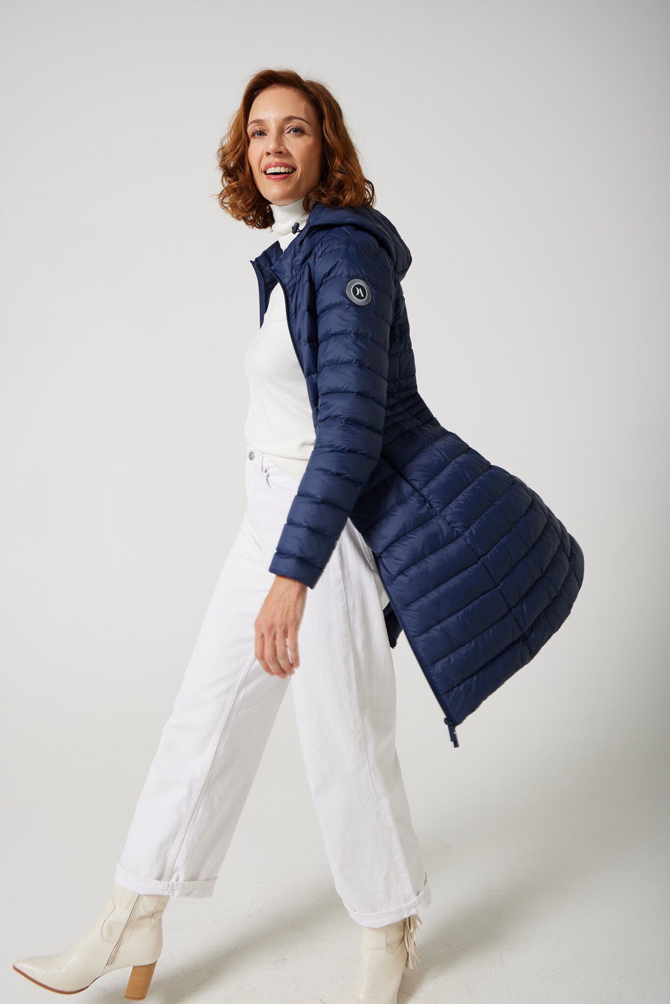 Women’s insulated midi-length hooded parka in navy blue, designed for warmth and comfort in South Africa’s winter season — Navy Midi Parka™