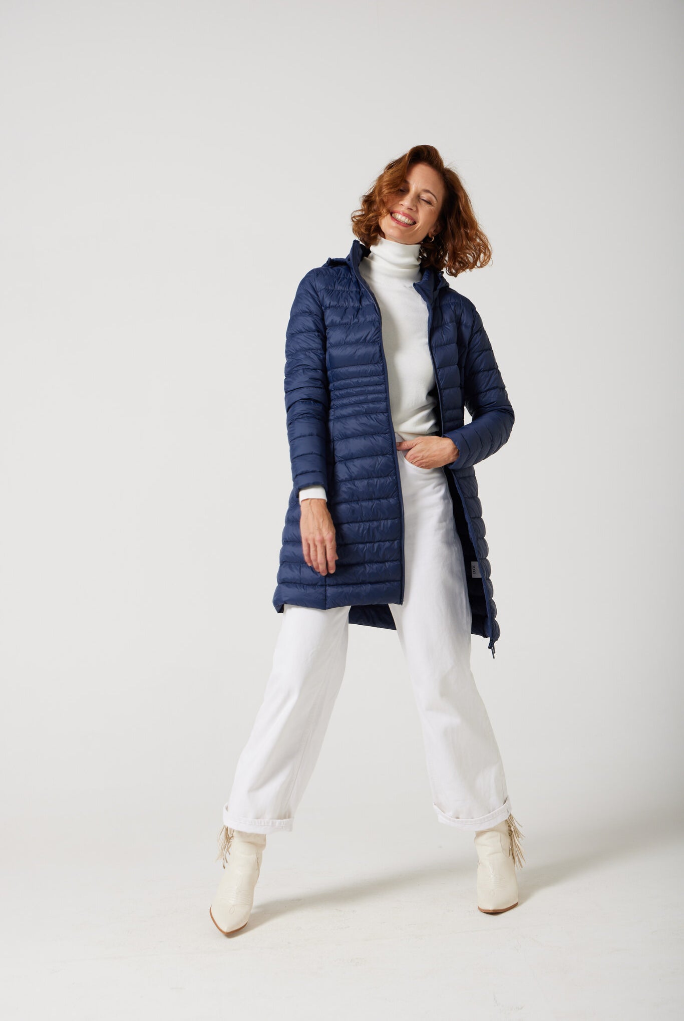 Women’s insulated midi-length hooded parka in navy blue, designed for warmth and comfort in South Africa’s winter season — Navy Midi Parka™