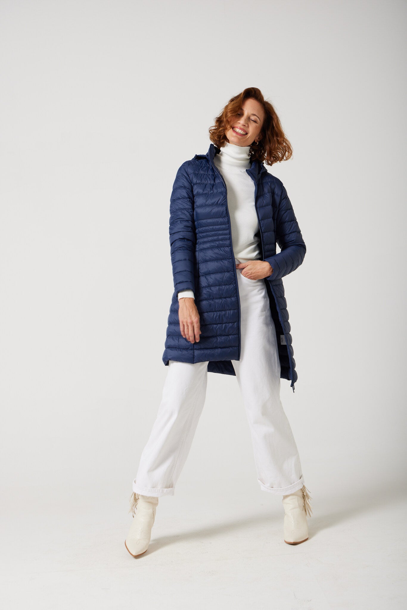 Women’s insulated midi-length hooded parka in navy blue, designed for warmth and comfort in South Africa’s winter season — Navy Midi Parka™