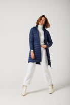 Women’s insulated midi-length hooded parka in navy blue, designed for warmth and comfort in South Africa’s winter season — Navy Midi Parka™